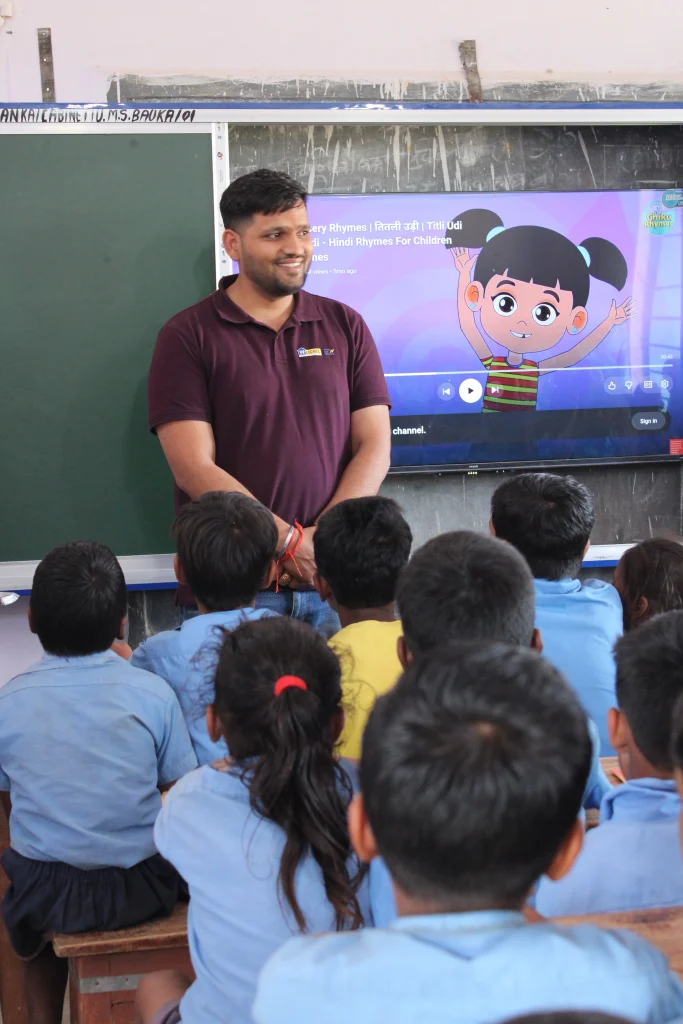 Rural students experiencing smart class set up by Digital Education NGO in Bihar