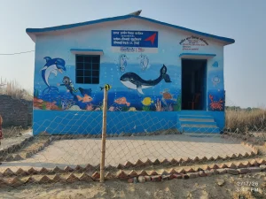 Beautifully renovated Anganwadi building with educational wall paintings by rural development NGO BJUP and HDFC Parivartan