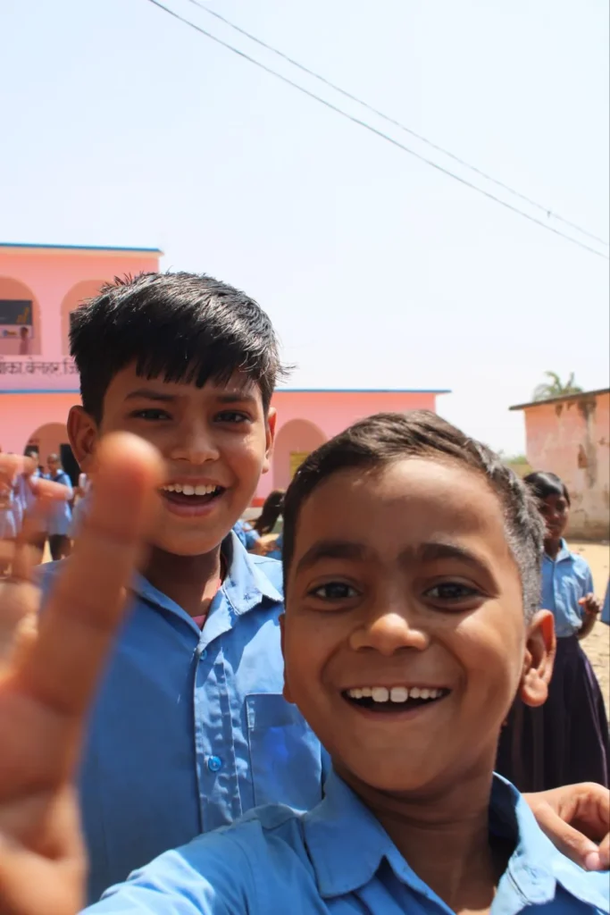 Exterior view of a newly established brightly painted community library and child safe space building by BJUP NGO in rural Bihar