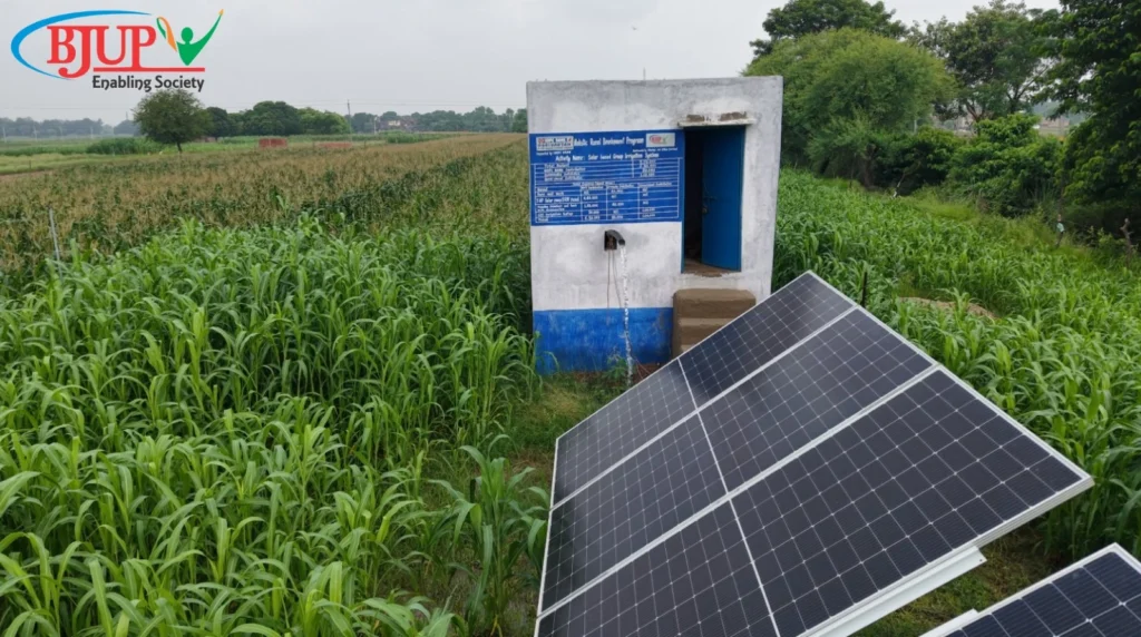 Solar panels and a pump house powering a 1200-meter flood-proof irrigation system by Climate-Resilient Agriculture NGO in Bihar BJUP in Bhojpur